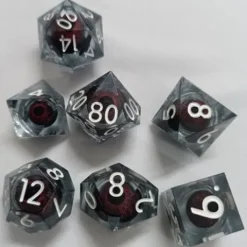 Galactic Dice Premium Dice Sets - Clear Brown Moving Eyes Sharp Resin Set of 7 Dice